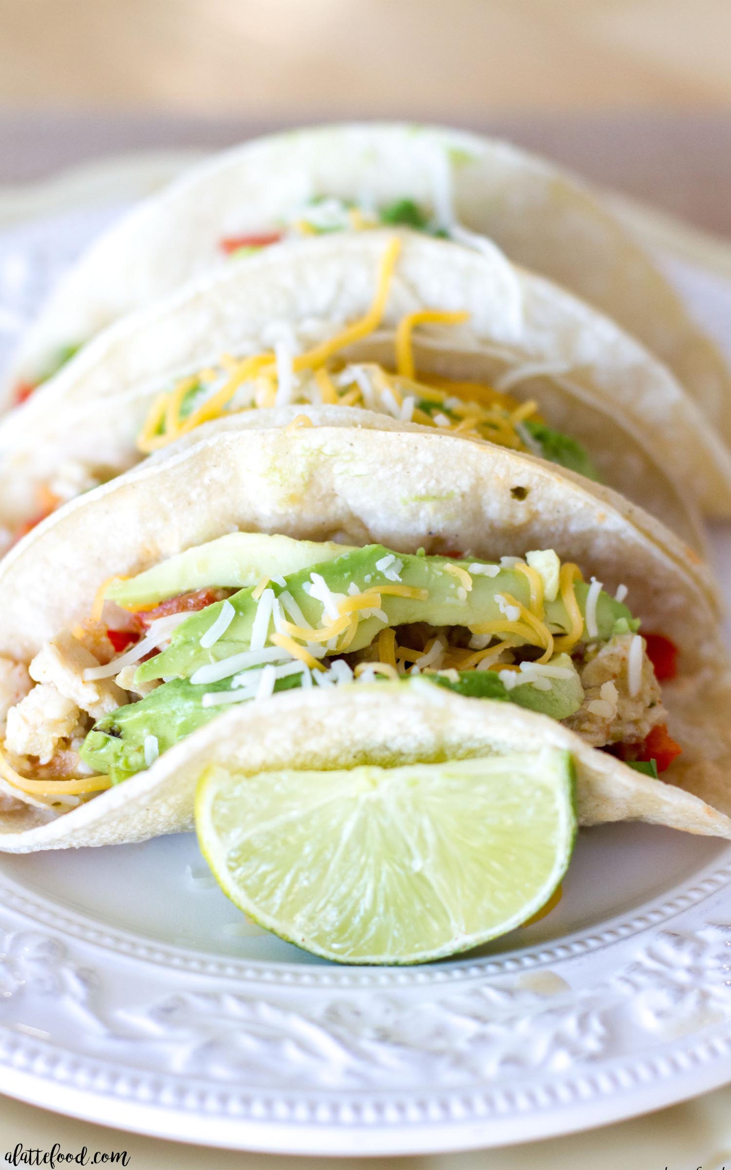 {Crockpot} Salsa Verde Honey Lime Chicken Tacos - A Latte Food